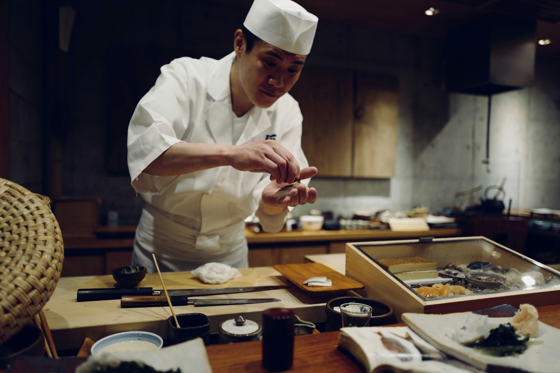 Chef working at the hinoki counter